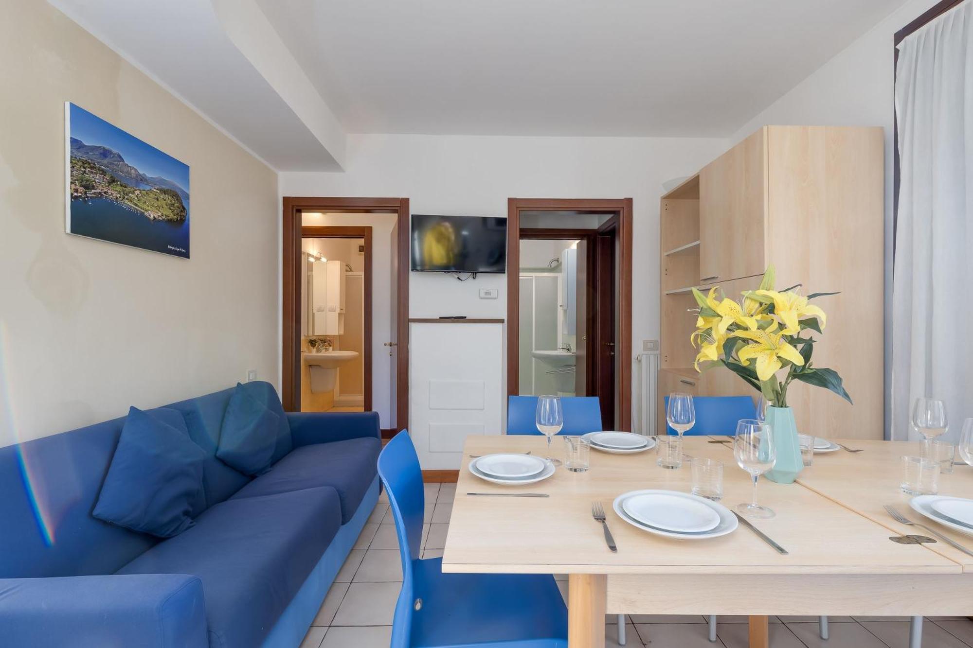 Budget Village Apartments - Porto Letizia Porlezza Extérieur photo