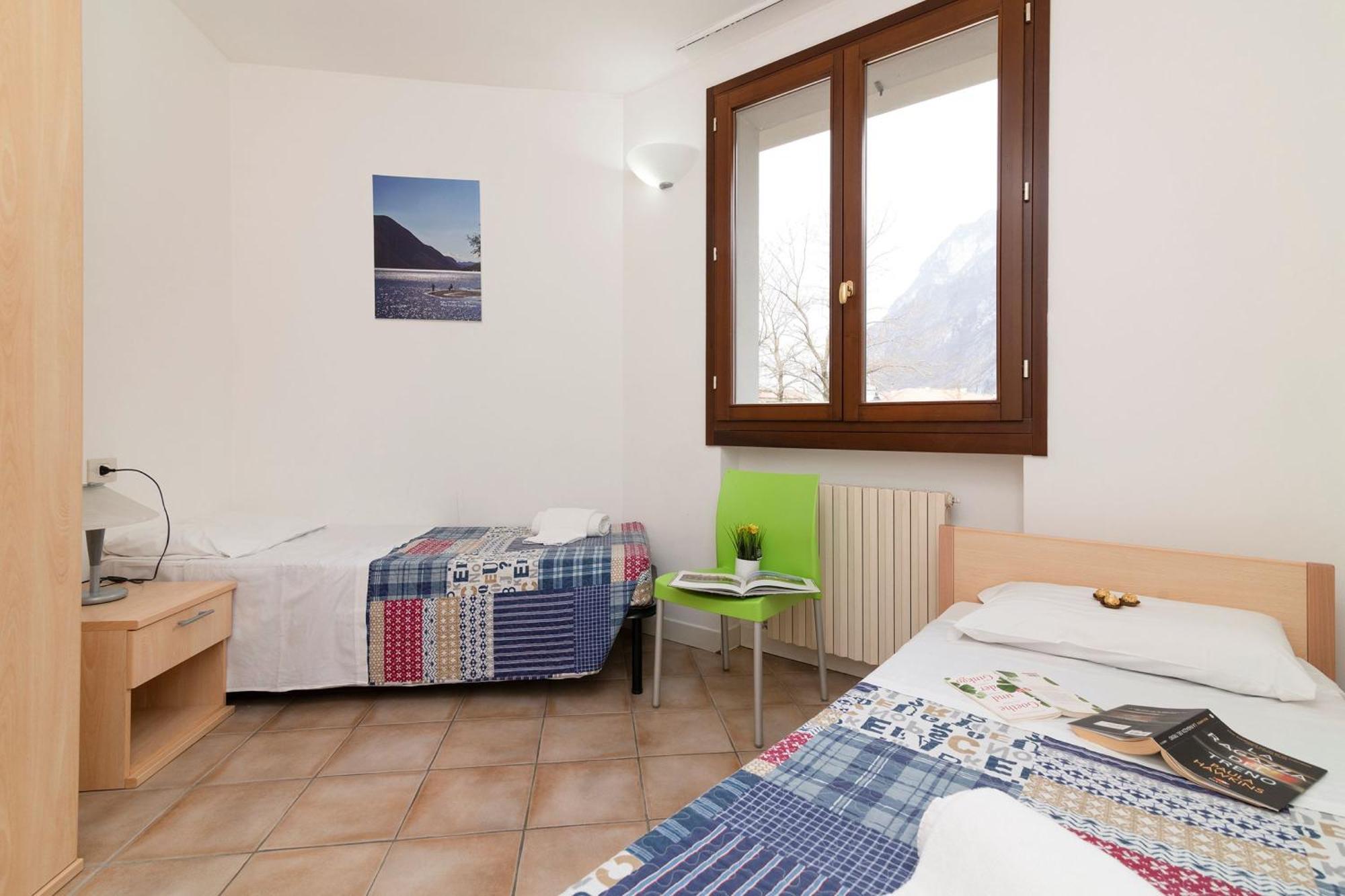 Budget Village Apartments - Porto Letizia Porlezza Extérieur photo