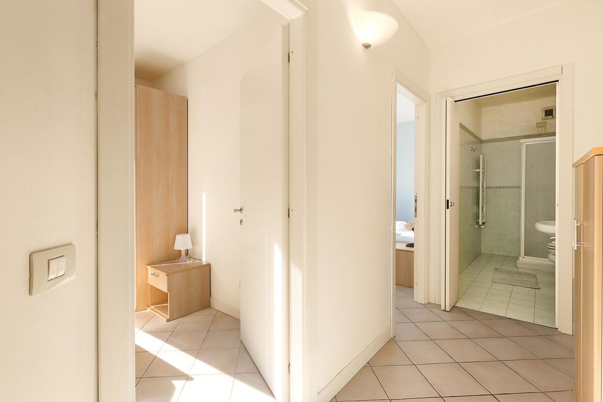 Budget Village Apartments - Porto Letizia Porlezza Extérieur photo