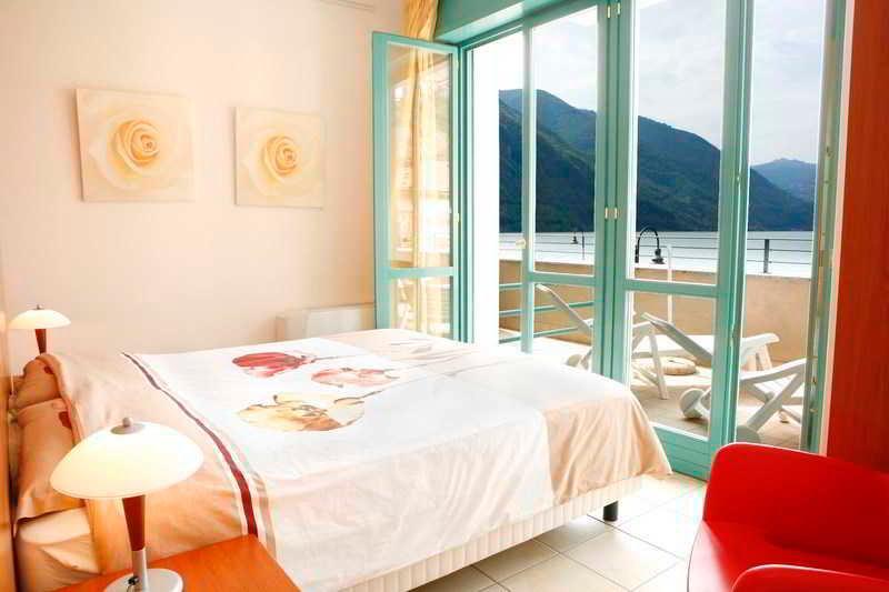 Budget Village Apartments - Porto Letizia Porlezza Extérieur photo