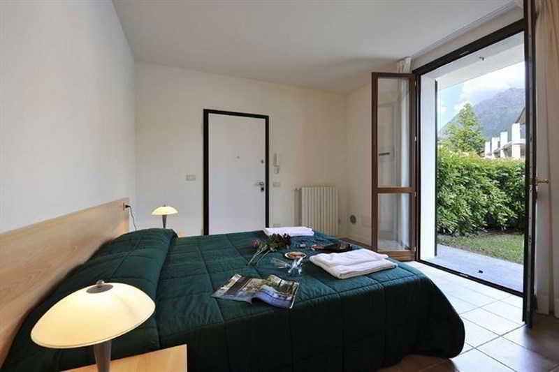 Budget Village Apartments - Porto Letizia Porlezza Extérieur photo